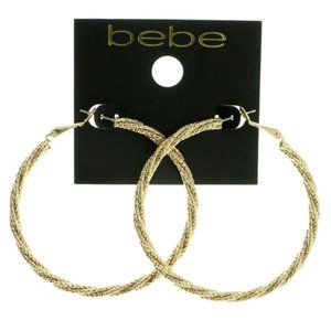 Bebe light-catching faceted gold hoop earrings